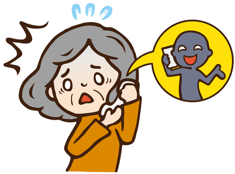 詐欺電話をとる高齢女性